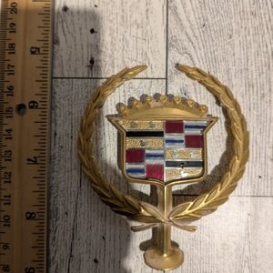 Cadillac Gold and Multicolor Emblem